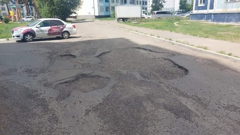 Ямы во дворах Ангарска